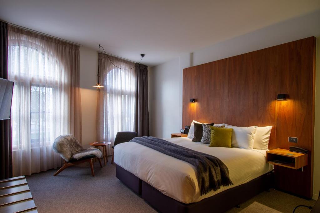 Postel nebo postele na pokoji v ubytování Moss Hotel
