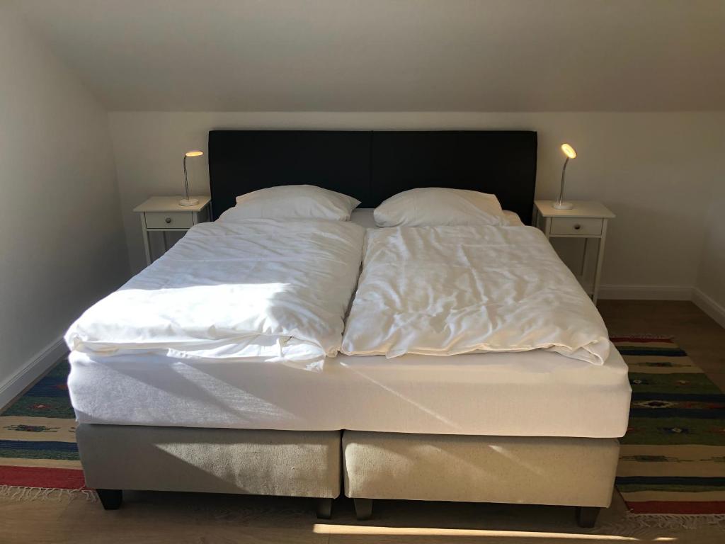 Postel nebo postele na pokoji v ubytování Haus 1
