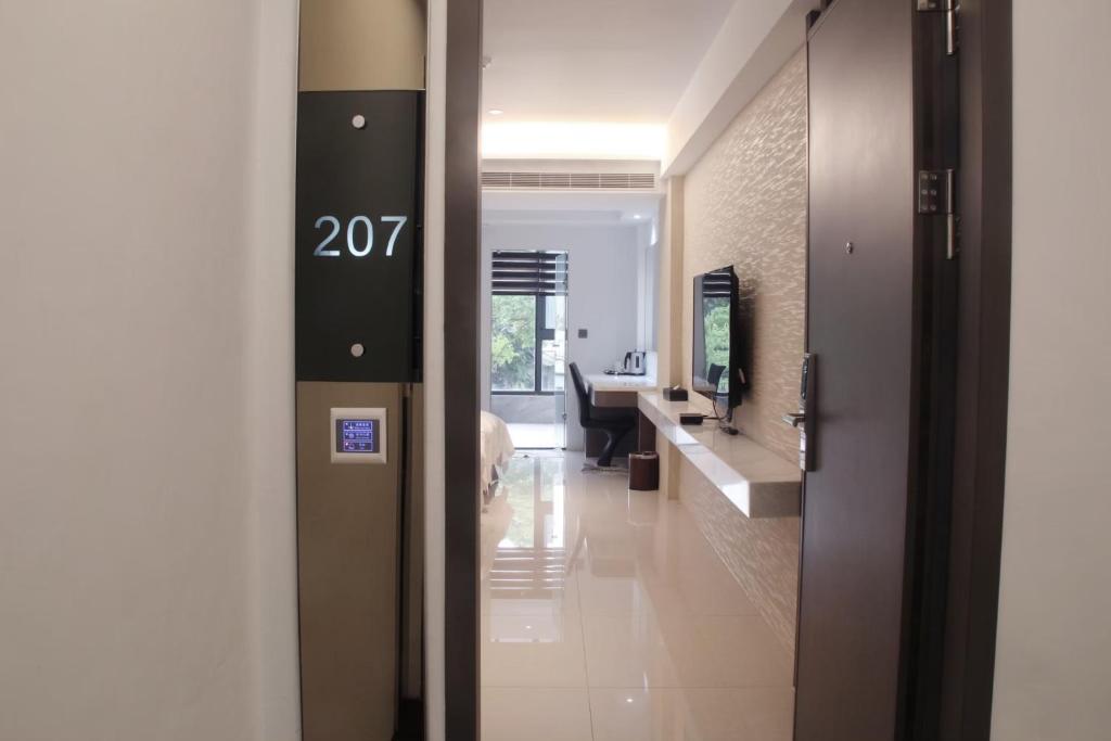 TV a/nebo společenská místnost v ubytování Gamalan Spring Hotel
