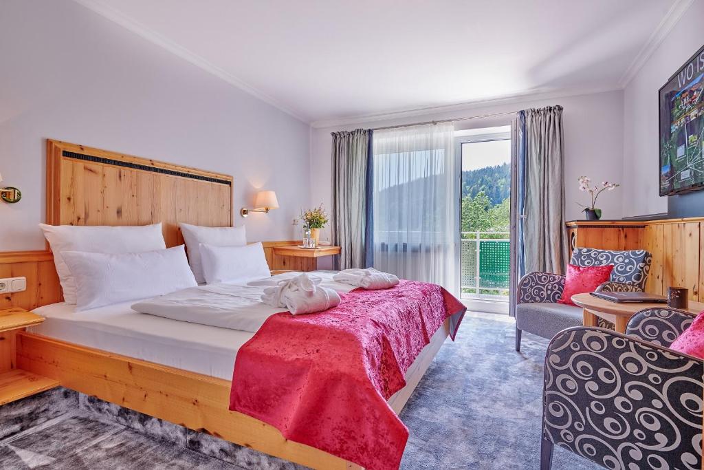Postel nebo postele na pokoji v ubytování Hotel Reinerhof
