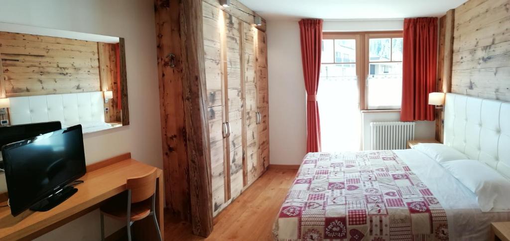 Postel nebo postele na pokoji v ubytování Hotel Ideal