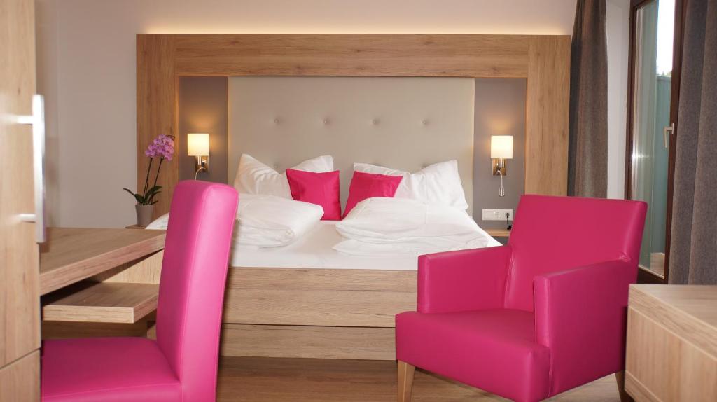 Postel nebo postele na pokoji v ubytování Ferienhotel Hofer superior