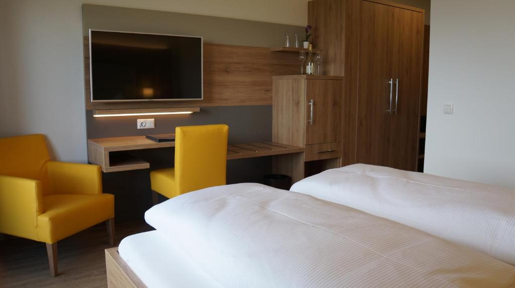 Postel nebo postele na pokoji v ubytování Ferienhotel Hofer superior