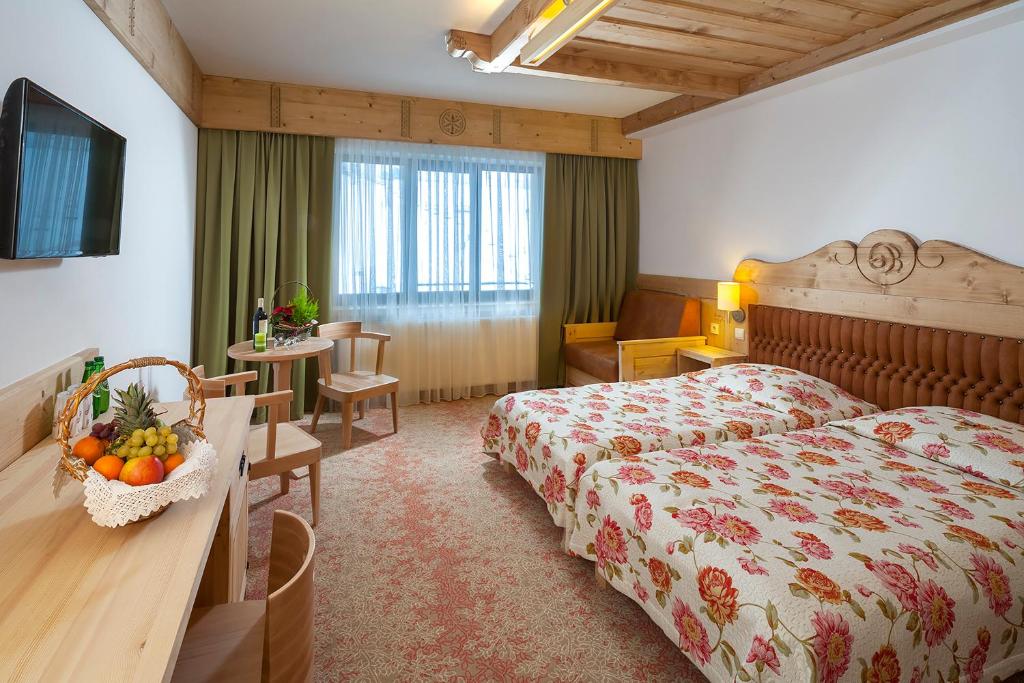Posteľ alebo postele v izbe v ubytovaní Hotel Bania Thermal & Ski