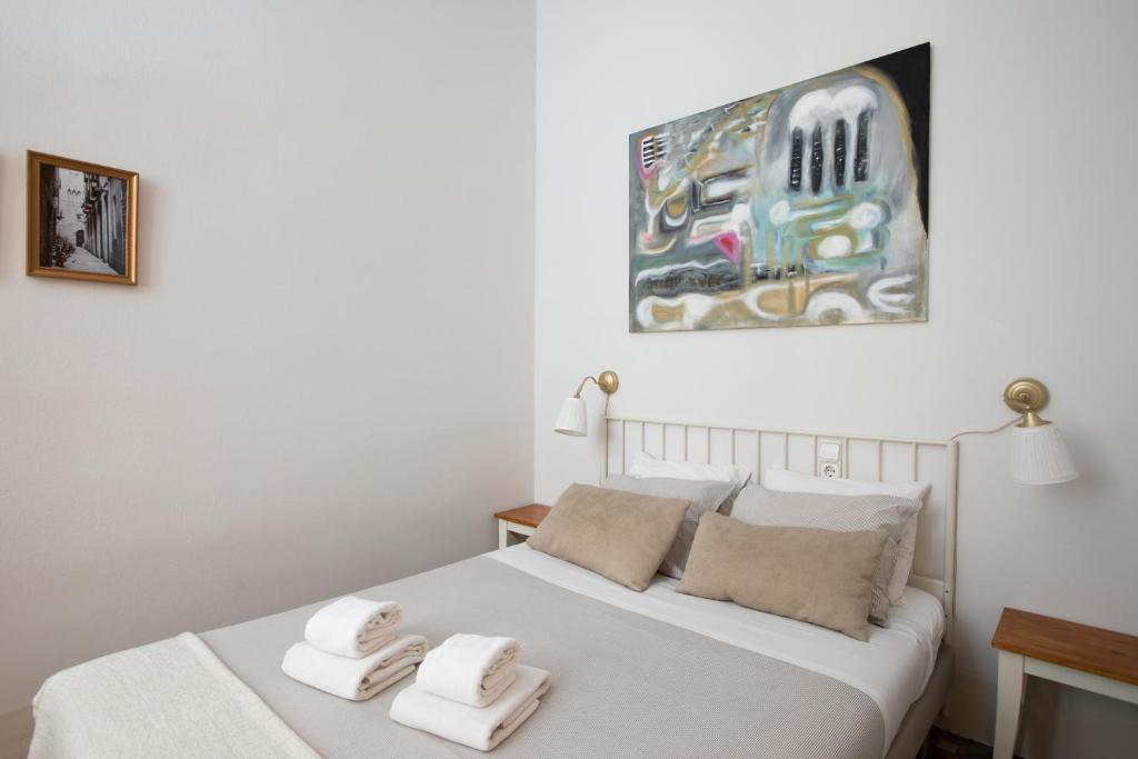 Postel nebo postele na pokoji v ubytování CasaNova Guest House