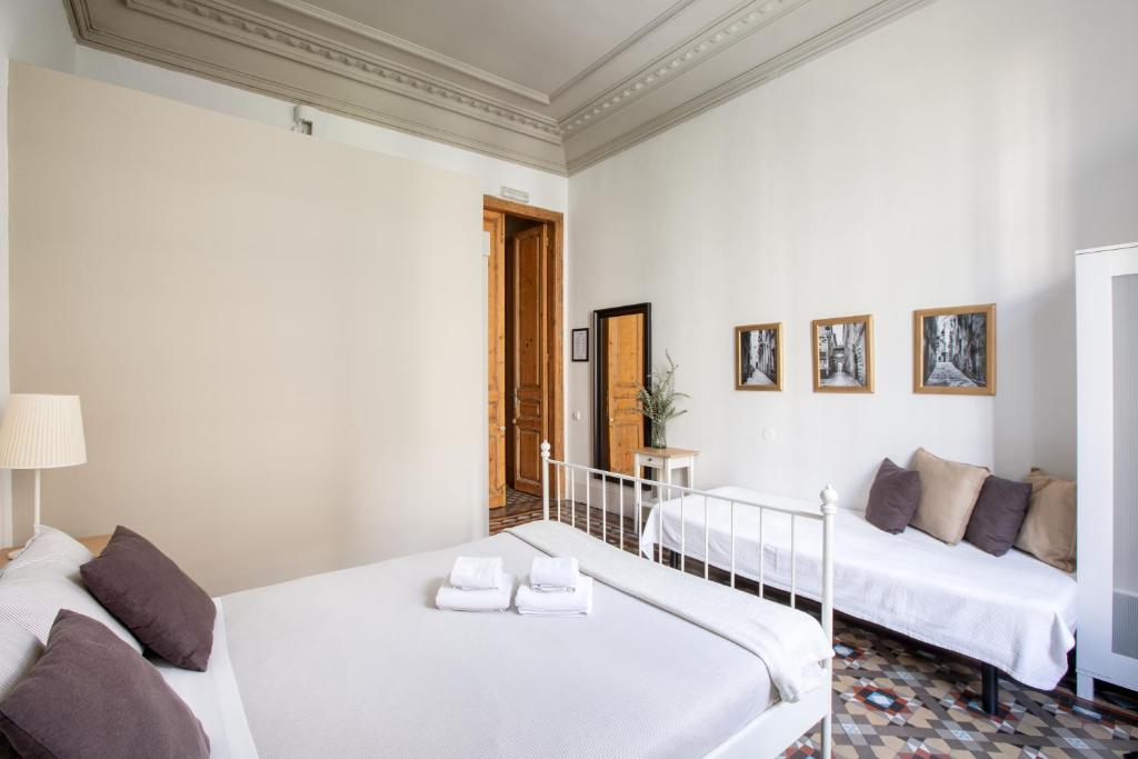 Postel nebo postele na pokoji v ubytování CasaNova Guest House