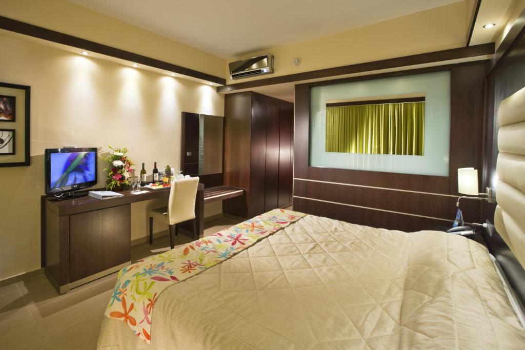 Postelja oz. postelje v sobi nastanitve Oceanis Beach & Spa Resort