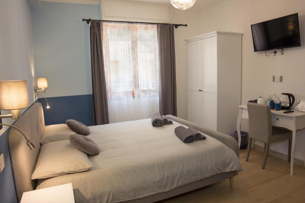 Postel nebo postele na pokoji v ubytování Shardan Guest House