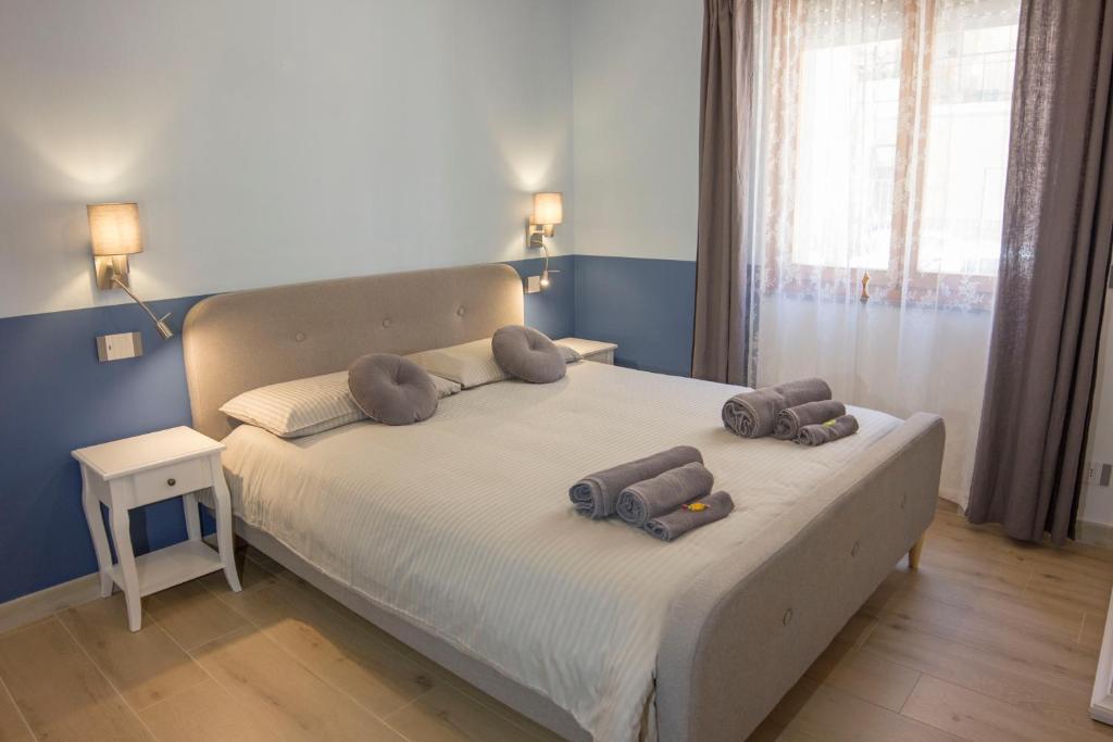 Postel nebo postele na pokoji v ubytování Shardan Guest House