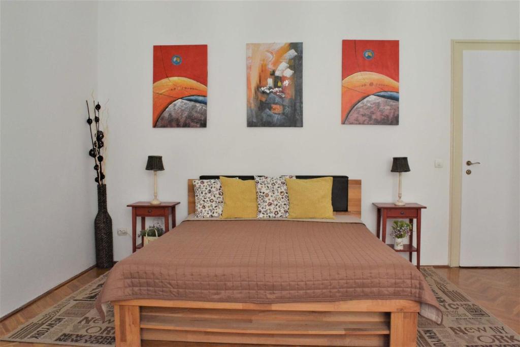 Posteľ alebo postele v izbe v ubytovaní Paprika Apartment Grand