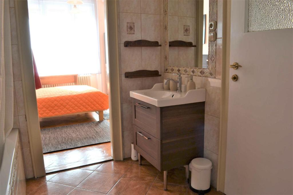 Posteľ alebo postele v izbe v ubytovaní Paprika Apartment Grand