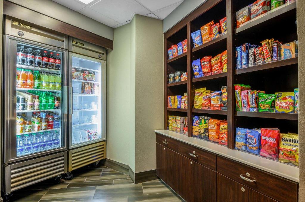 a refrigerator filled with lots of food and drinks at La Quinta by Wyndham Myrtle Beach Broadway Area in Myrtle Beach