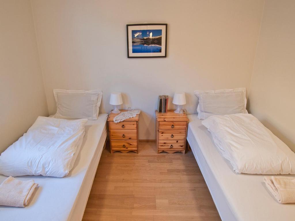 Postel nebo postele na pokoji v ubytování Skyrhusid HI Hostel