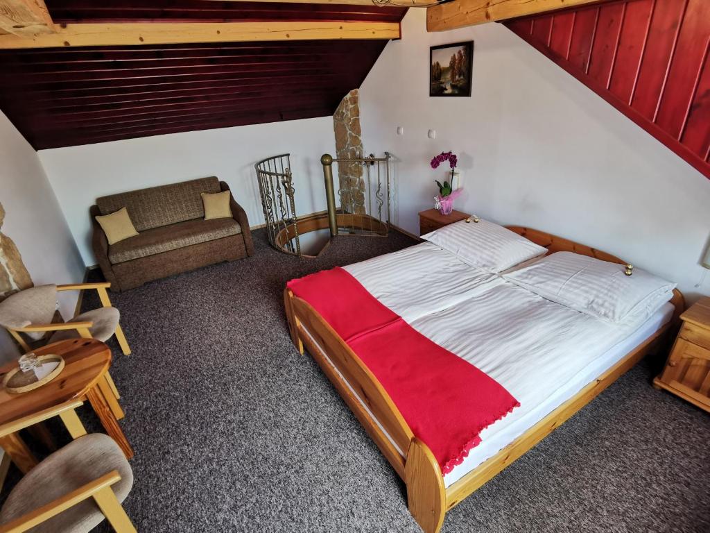 Posteľ alebo postele v izbe v ubytovaní Dom pod Tujami