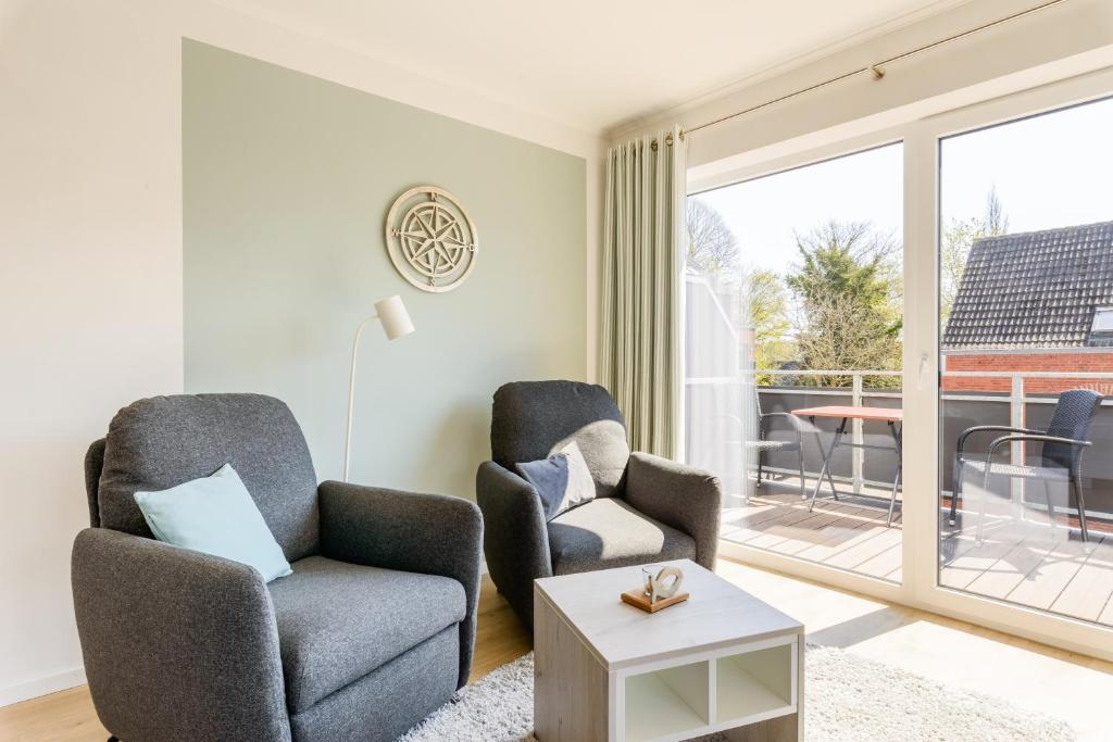 Posezení v ubytování Nordsee-Hotel Hinrichsen