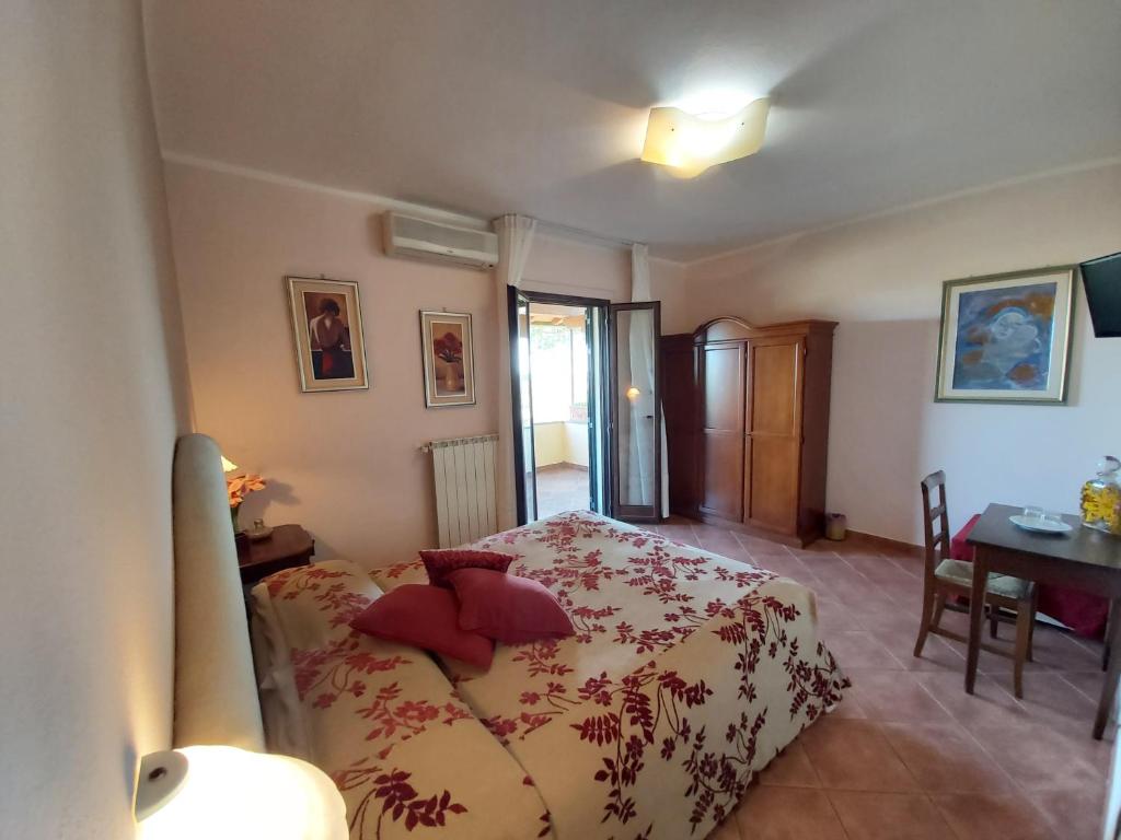 Posteľ alebo postele v izbe v ubytovaní Agriturismo - B&B L'Acquacotta