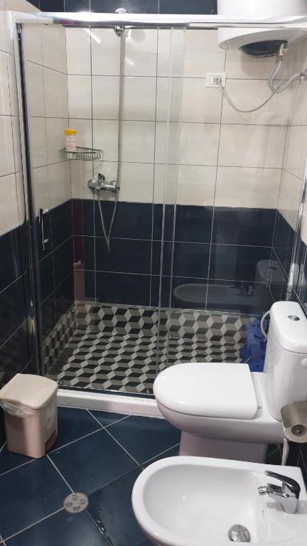 Koupelna v ubytování Haris Hotel