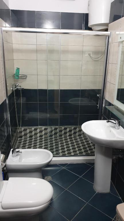 Koupelna v ubytování Haris Hotel
