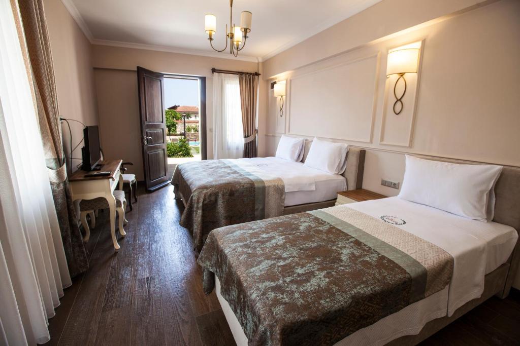 Livia Garden Hotel - Camera Familiare Con Vista Giardino
