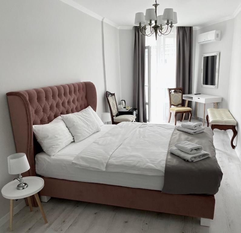Letto o letti in una camera di Opera Center Hotel & Apartments