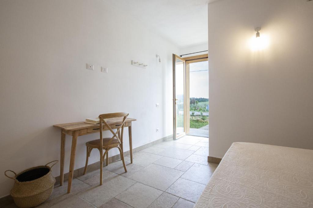 Postel nebo postele na pokoji v ubytování Agriturismo Casa Ricci