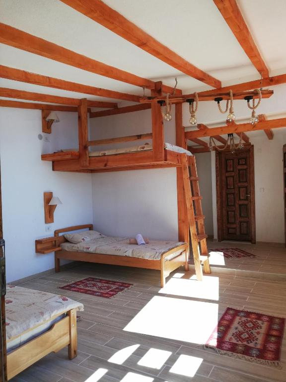 Postel nebo postele na pokoji v ubytování Paradise Nest