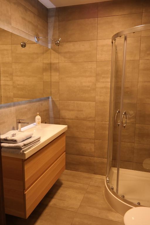Kúpeľňa v ubytovaní Apartament Nadwarciański