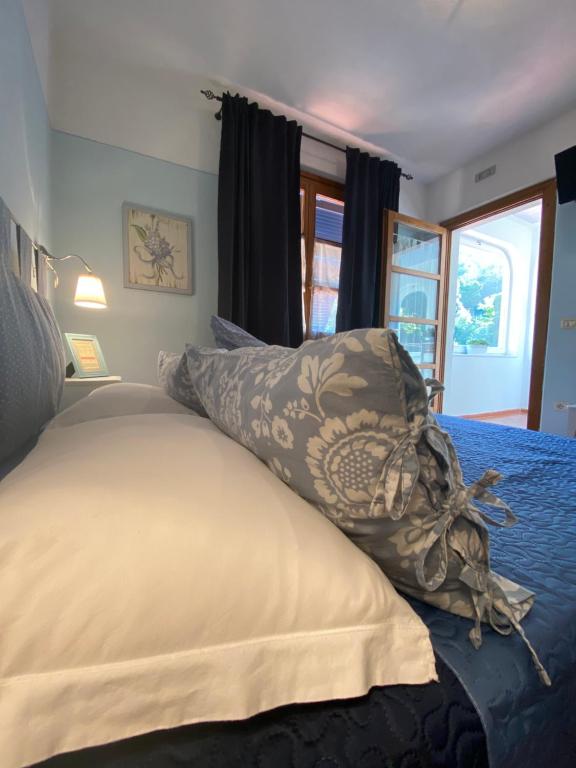 Postel nebo postele na pokoji v ubytování Valle dei Mulini B&B