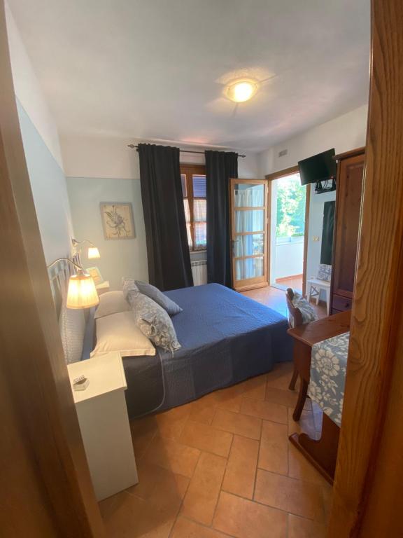 Postel nebo postele na pokoji v ubytování Valle dei Mulini B&B