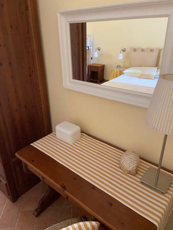 Postel nebo postele na pokoji v ubytování Valle dei Mulini B&B