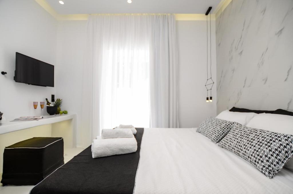 Posteľ alebo postele v izbe v ubytovaní Diadema Apartments in the Town