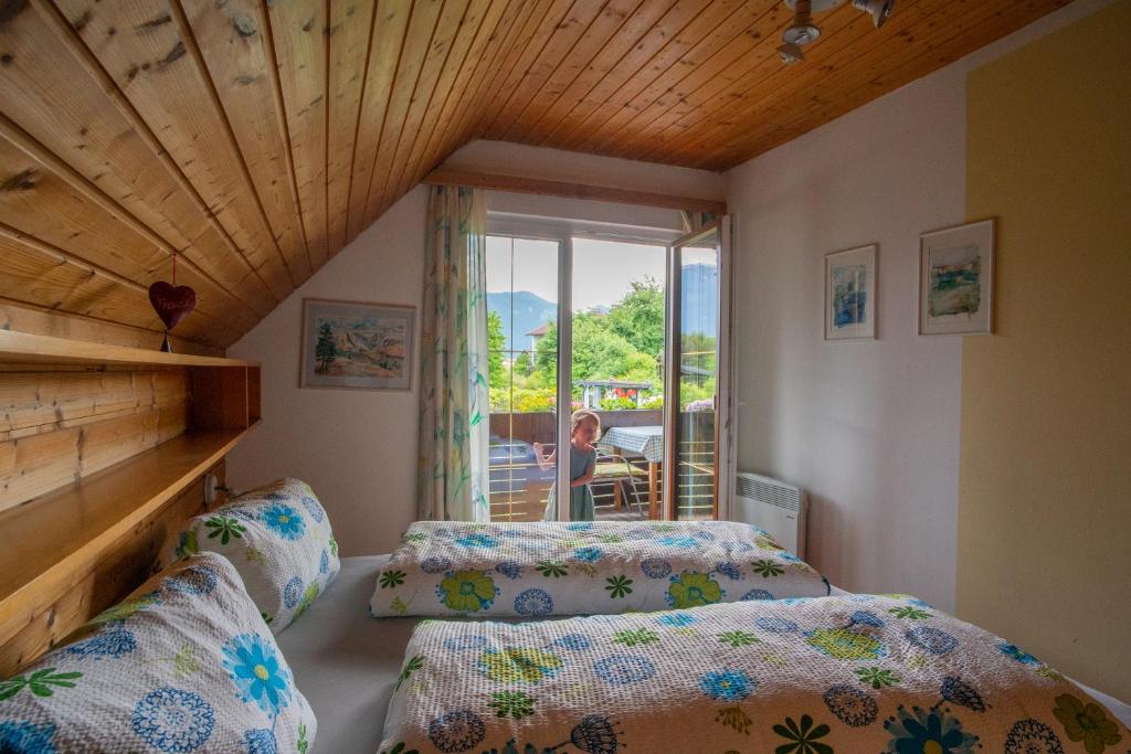 Postel nebo postele na pokoji v ubytování Apartments Krista