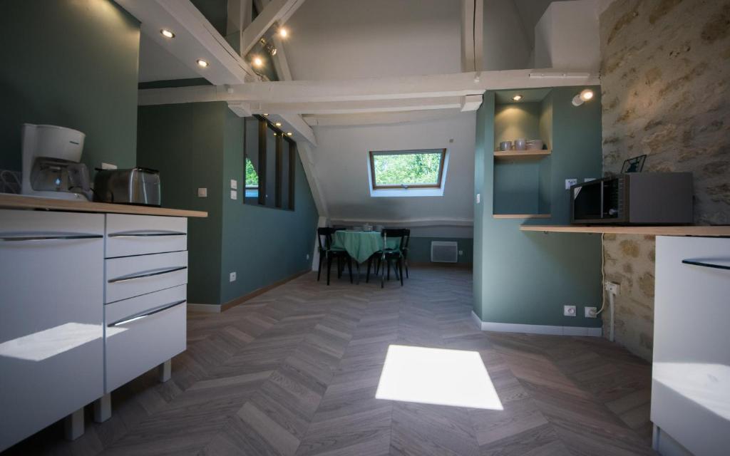 Kuchyň nebo kuchyňský kout v ubytování Gîte Mise au Vert