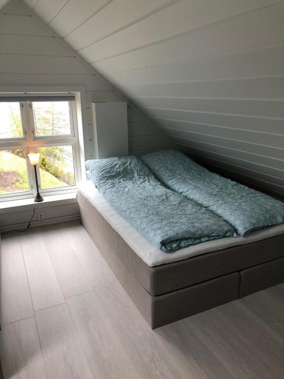 Postel nebo postele na pokoji v ubytování Tunold Gård - Freden