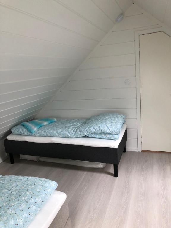 Postel nebo postele na pokoji v ubytování Tunold Gård - Freden