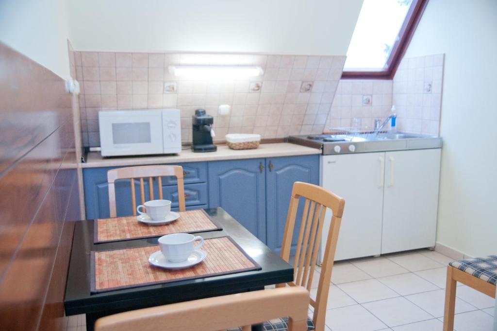 Kuchyňa alebo kuchynka v ubytovaní Apartments Yowan