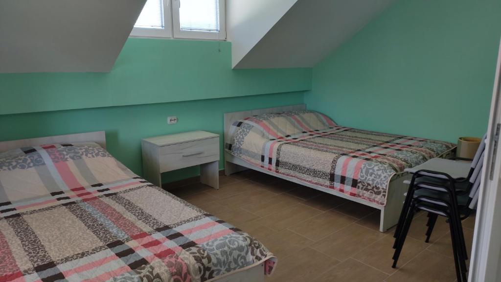 Posteľ alebo postele v izbe v ubytovaní Apartments Maja