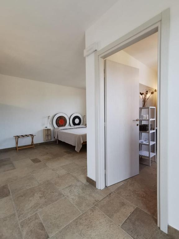 Postel nebo postele na pokoji v ubytování Agriturismo Casa Ricci