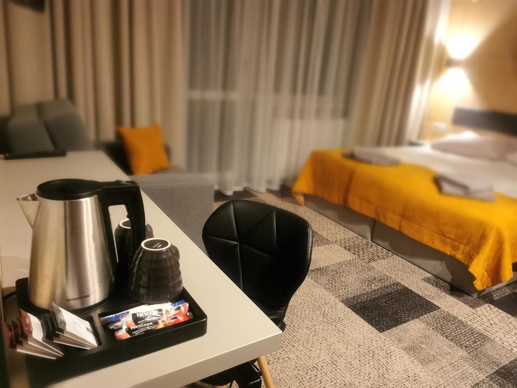 Postel nebo postele na pokoji v ubytování KRISTINA Willa & Spa