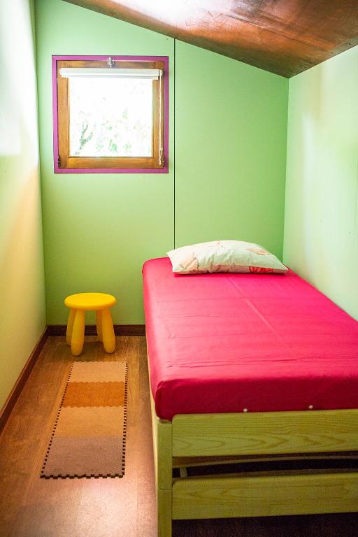 Postel nebo postele na pokoji v ubytování LaranjaLimão