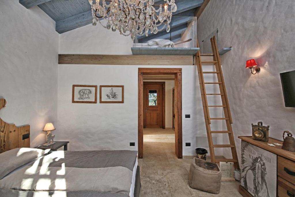 TV a/nebo společenská místnost v ubytování Pietra Cavalla - Ranch & Resort