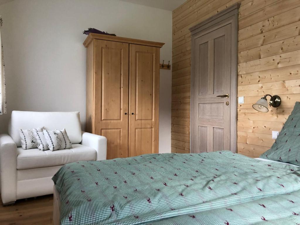 Posteľ alebo postele v izbe v ubytovaní Ausseer Chalet (nahe Hallstatt), Appartements