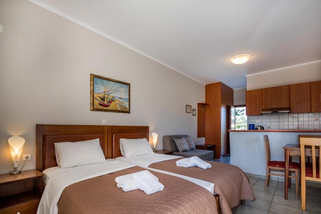 Postel nebo postele na pokoji v ubytování Katerina Hotel