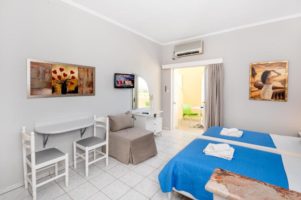 Postel nebo postele na pokoji v ubytování Katerina Hotel
