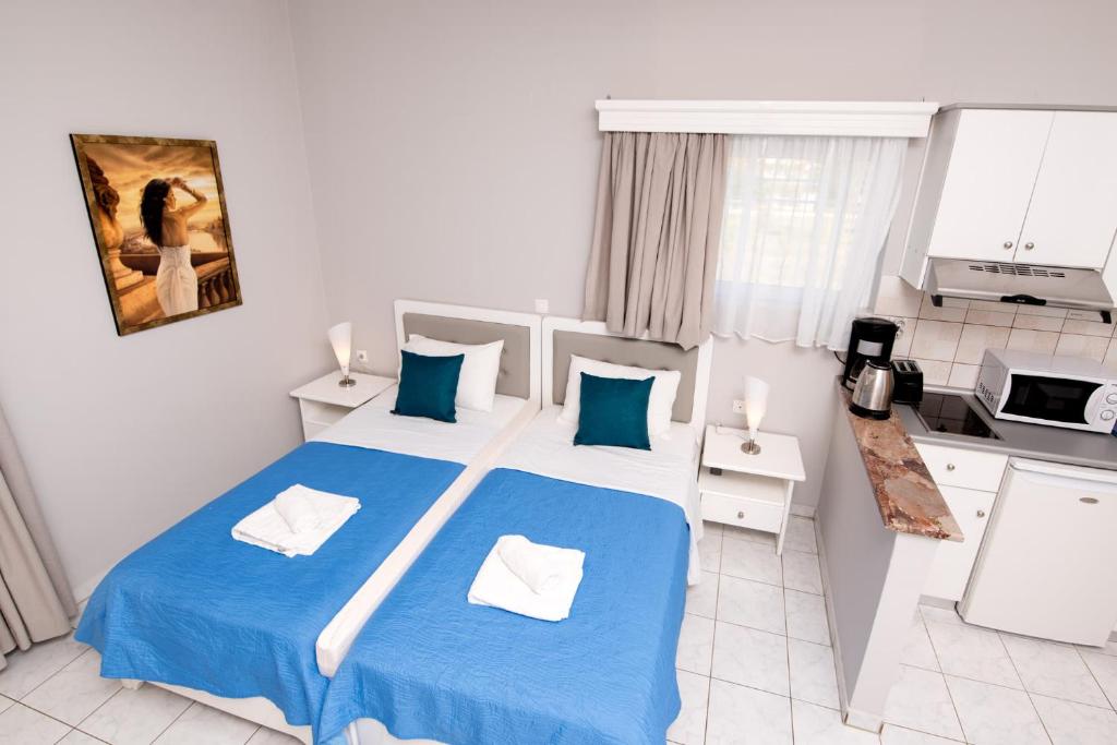 Kuchyň nebo kuchyňský kout v ubytování Katerina Hotel