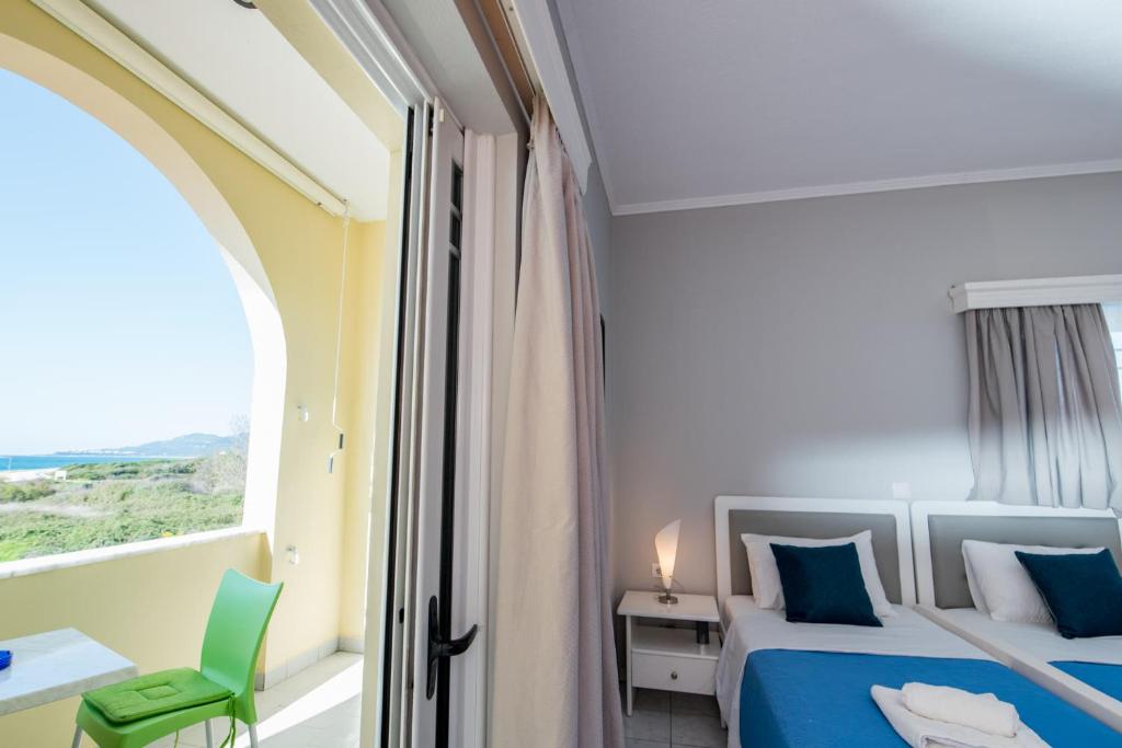 Postel nebo postele na pokoji v ubytování Katerina Hotel