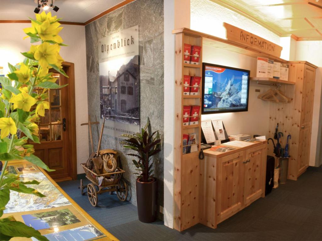 a store room with a counter and a plant at Alpenblick in Zermatt