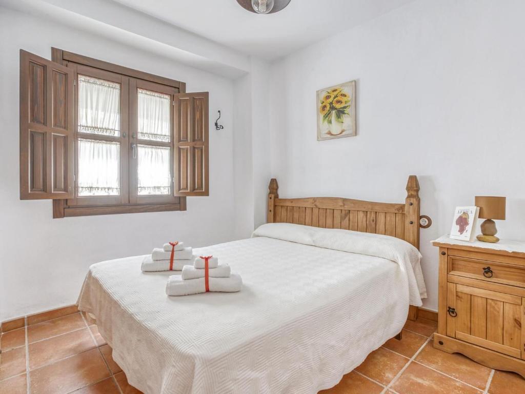 Łóżko lub łóżka w pokoju w obiekcie Villa in Carcabuey near Sierras Subbeticas Park