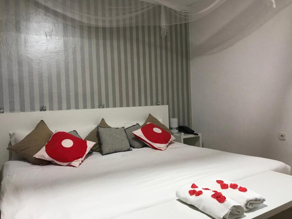 Postel nebo postele na pokoji v ubytování Hotel Argos