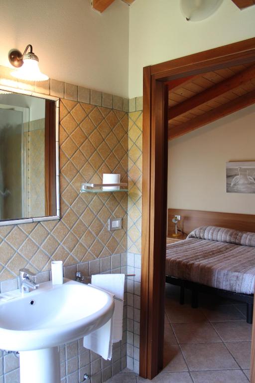 Posteľ alebo postele v izbe v ubytovaní Agriturismo Ravaglia Grande